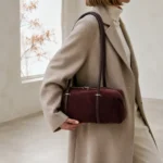 NMCOMCM-B0199L bordinė 39 × 13 × 18 cm zomšinė ir odinė rankinė su modeliu